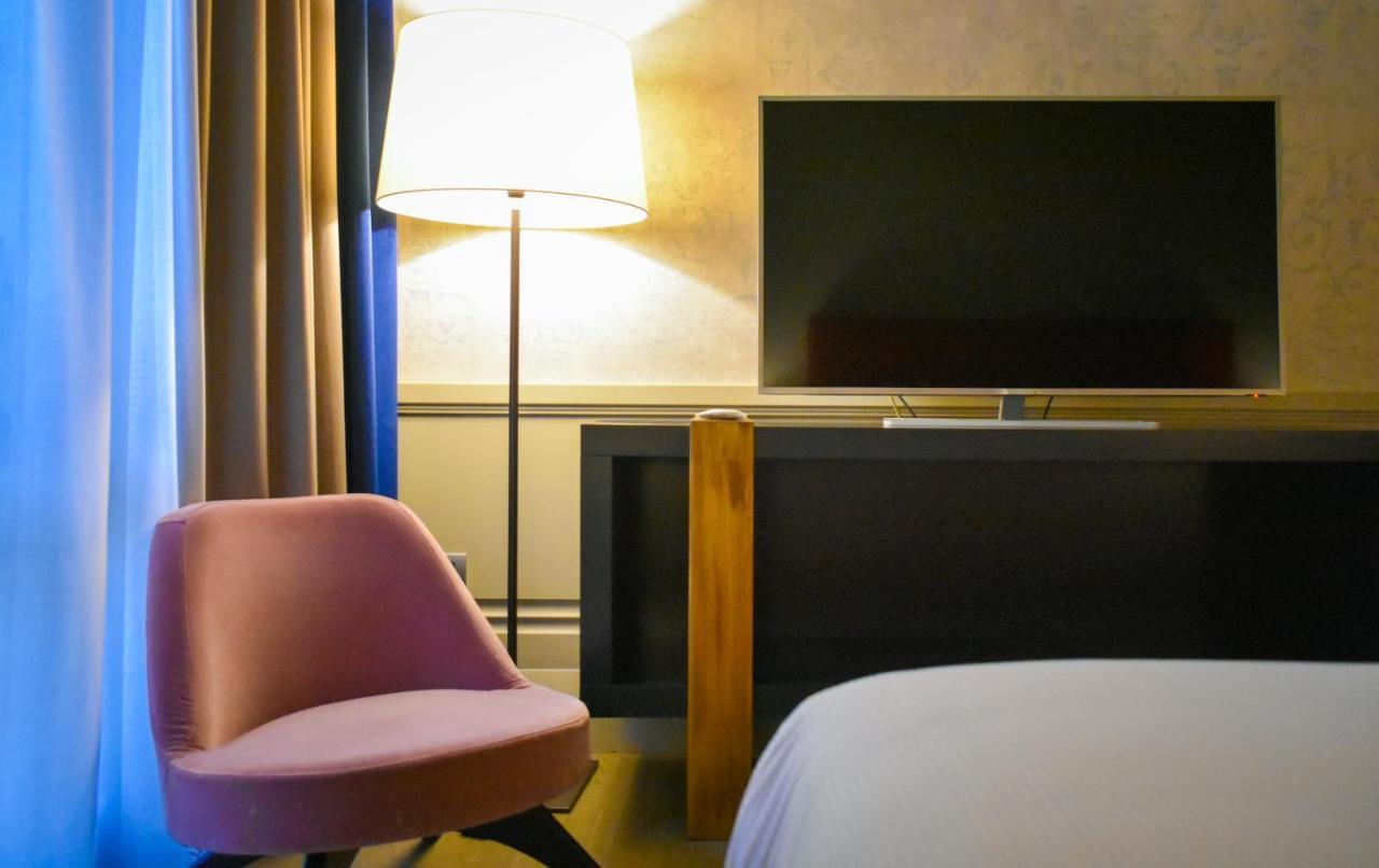 팔라초 코르날리아 호텔 밀라노 외부 사진 A room at the hotel
