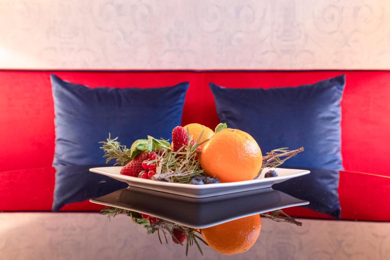 팔라초 코르날리아 호텔 밀라노 외부 사진 A fruit salad