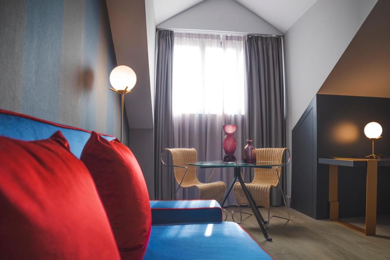 팔라초 코르날리아 호텔 밀라노 외부 사진 A room at the hotel