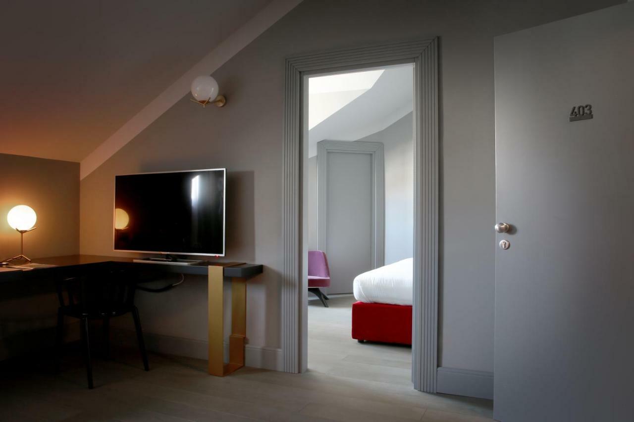 팔라초 코르날리아 호텔 밀라노 외부 사진 A room at the hotel